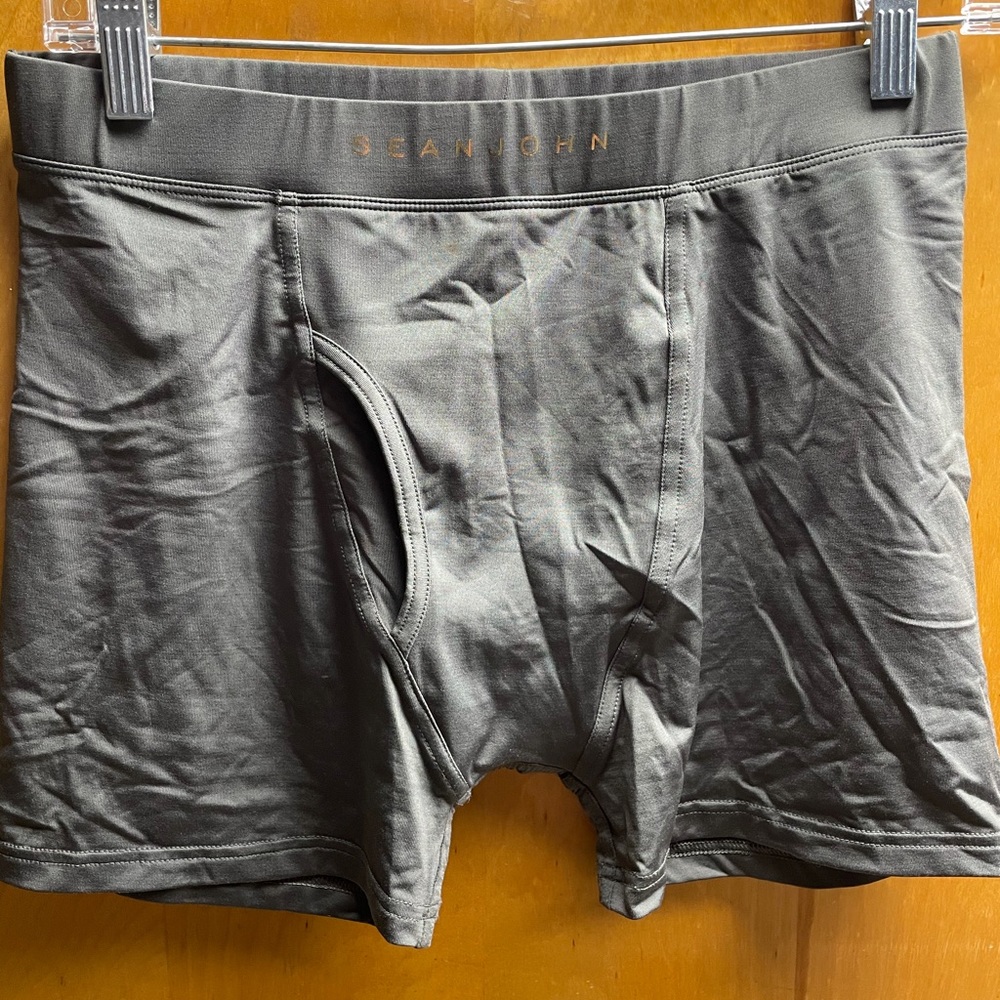 Men’s grey Sean John poly spandex trunks size M